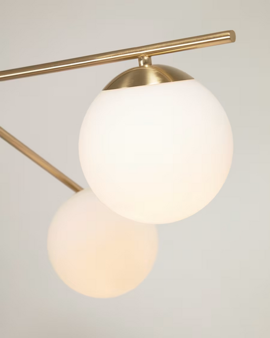 Kave Home Mahala steel ceiling light with brass finish and three frosted glass